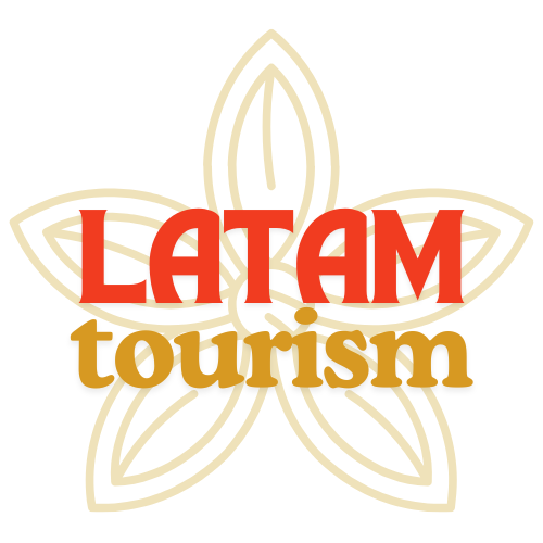 LatamTourism travel blog logo featuring bold red and gold text on a floral-inspired design symbolizing the vibrancy of Latin American culture.